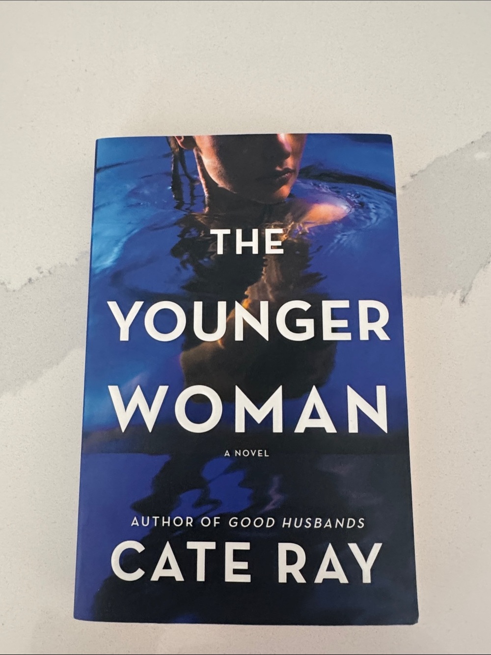 The Younger Woman by Cate Ray - Blue Cover Paperback